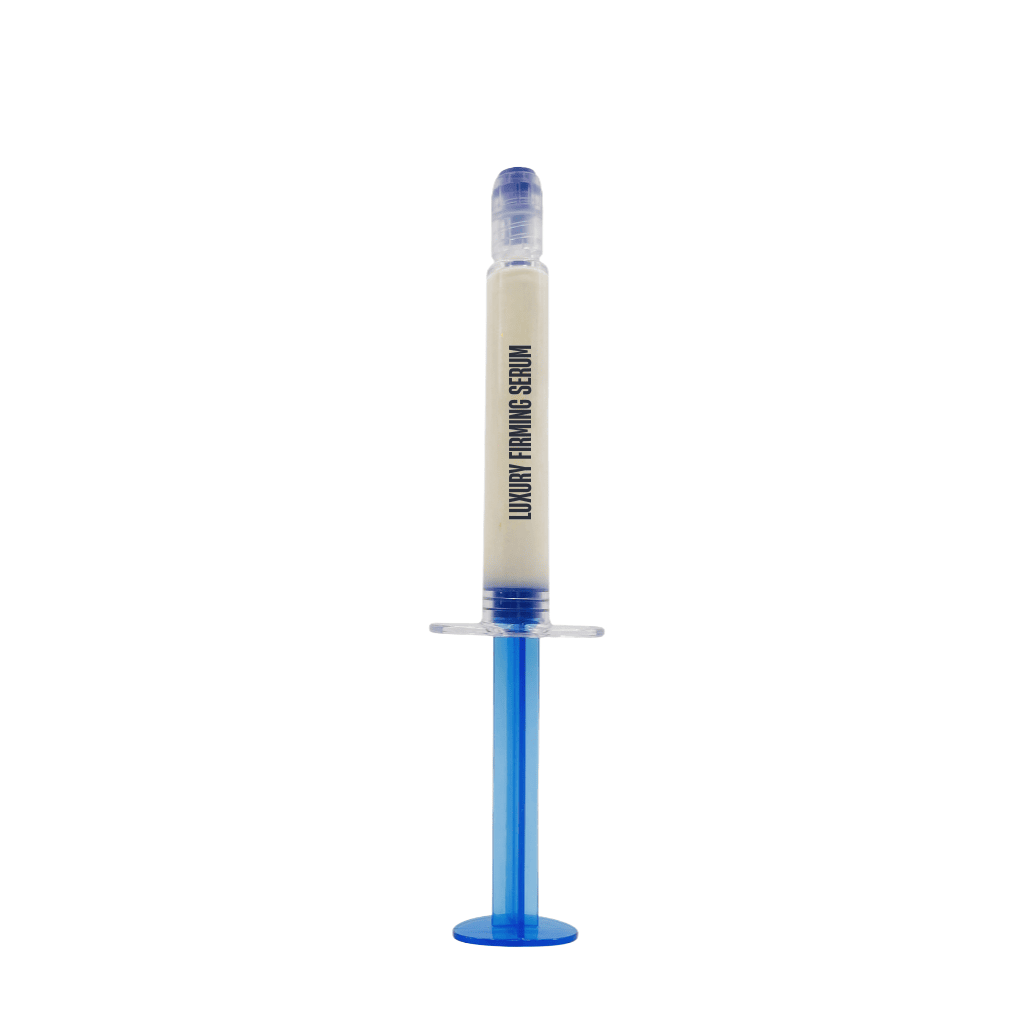 Deluxe Firming Serum in a syringe applicator, showcasing its lightweight and silky texture for smooth, radiant skin.