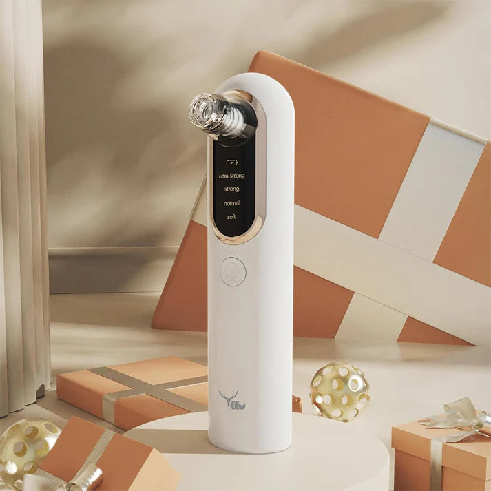 Zentheca – ClearSkin Pro Facial Cleansing Device on a table with festive decorations.