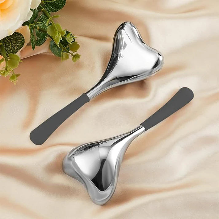 Zentheca – Facial Massage Stick showing sleek stainless steel design for relaxation and improved blood circulation.