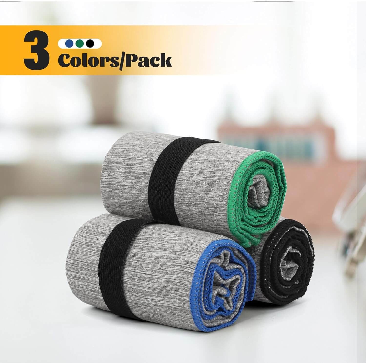 Zentheca SwiftDry 3-Pack Fast-Drying Microfiber Gym Towels in gray, green, and blue stacked on a table.