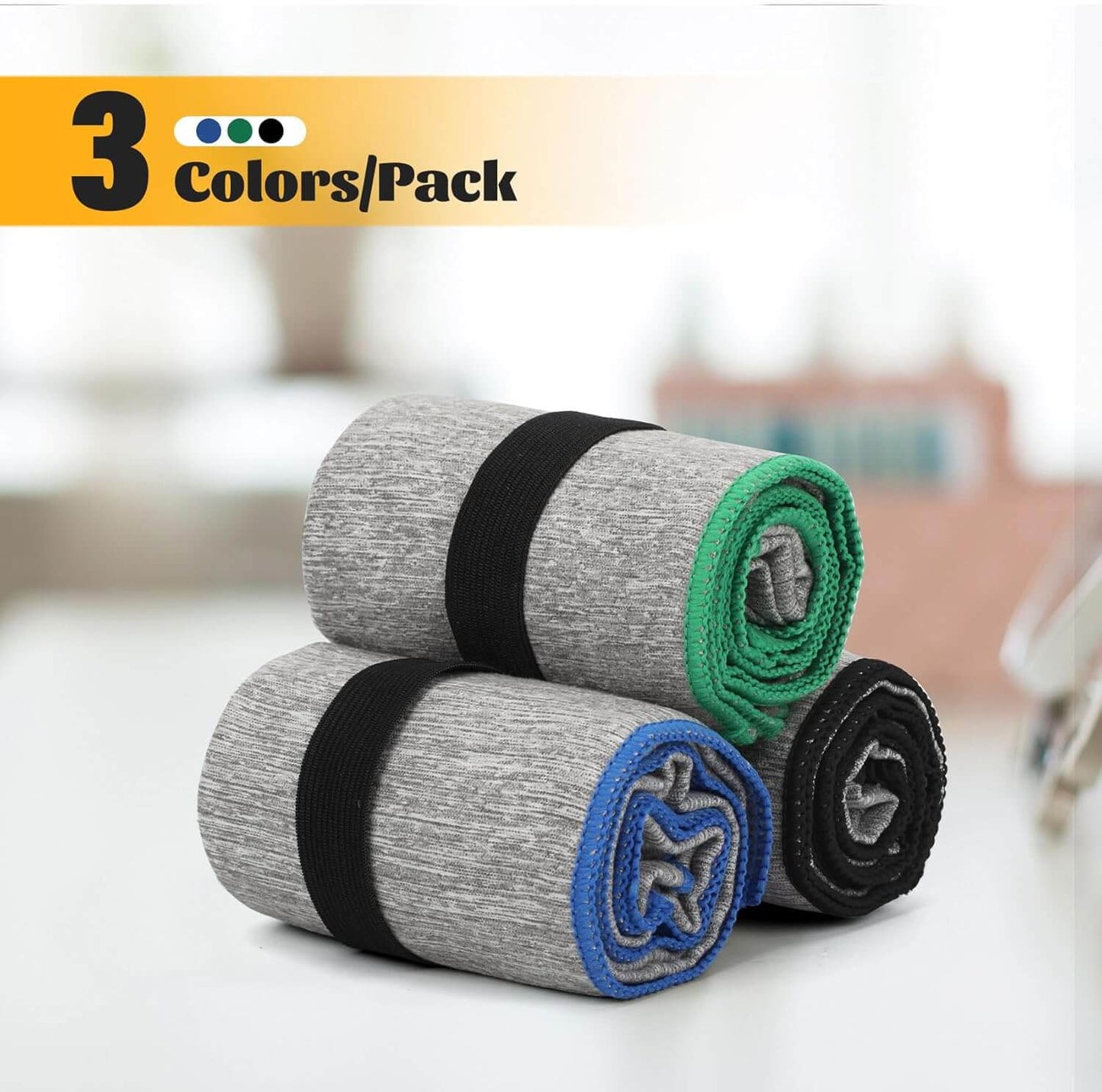 Zentheca SwiftDry 3-Pack Fast-Drying Microfiber Gym Towels in gray, green, and blue stacked on a table.