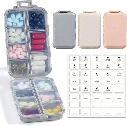 Zentheca Travel Pill Organizer with compartments for vitamins and medication in khaki, gray, and pink, includes customizable labels.